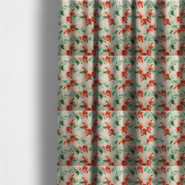 The fabric used to create these made-to-measure curtains is a botanical upholstery fabric on a neutral cream background featuring a repeating painterly pattern of leafy branches in shades of vibrant orange, coral, deep green, and pale mint-green.   