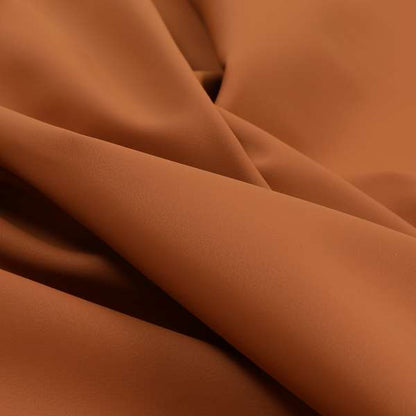 Kenya Matt Soft Faux Leather In Orange Peach Colour Upholstery Fabrics