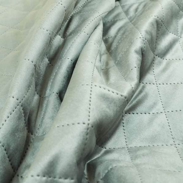 Rothko Quilted Velvet Plain Upholstery Fabric In Light Blue Colour