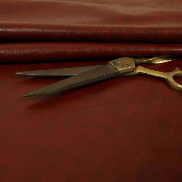 Suffolk Vinyl Upholstery Material Slippery Wet Feel Burgundy Red Colour Faux Leather