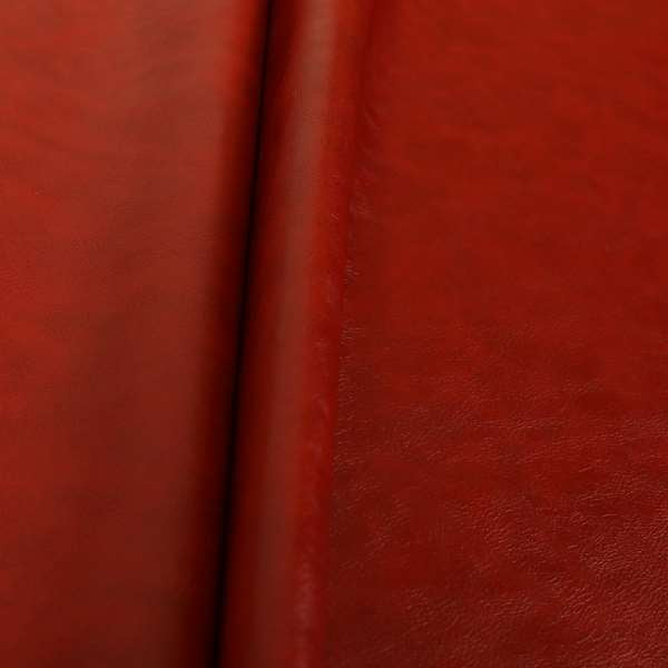 Suffolk Vinyl Upholstery Material Slippery Wet Feel Red Colour Faux Leather