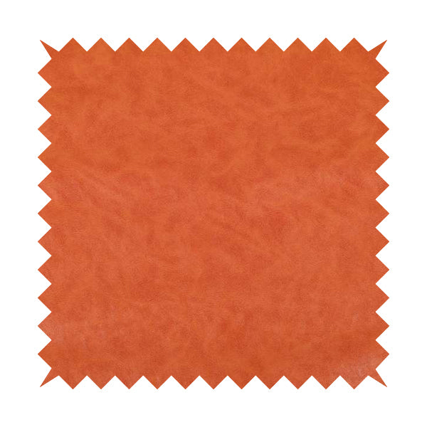 Suffolk Vinyl Upholstery Material Slippery Wet Feel Orange Colour Faux Leather