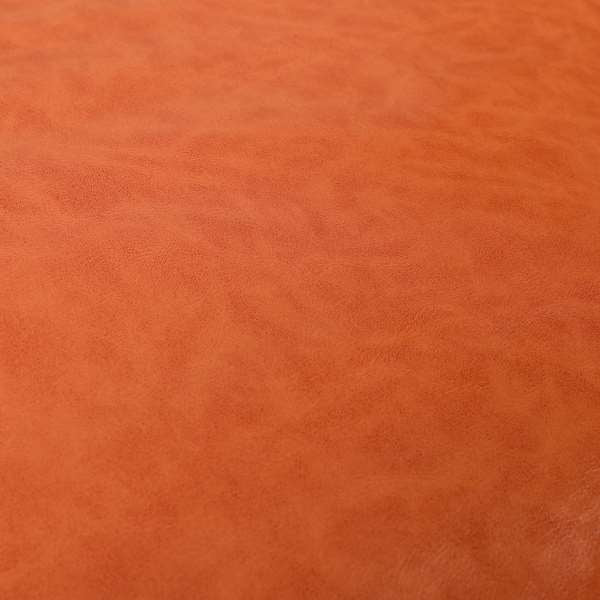 Suffolk Vinyl Upholstery Material Slippery Wet Feel Orange Colour Faux Leather