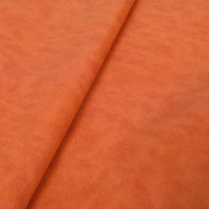 Suffolk Vinyl Upholstery Material Slippery Wet Feel Orange Colour Faux Leather