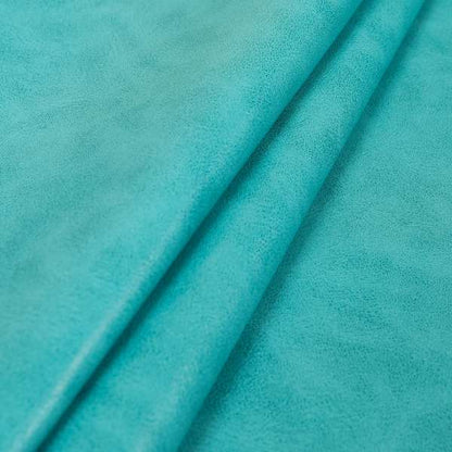 Suffolk Vinyl Upholstery Material Slippery Wet Feel Teal Blue Colour Faux Leather