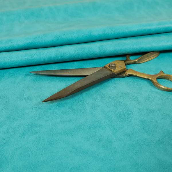 Suffolk Vinyl Upholstery Material Slippery Wet Feel Teal Blue Colour Faux Leather