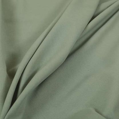 Wiltshire Plain Poly Cotton Flat Weave Upholstery Curtains Fabric In Light Sage Green Colour